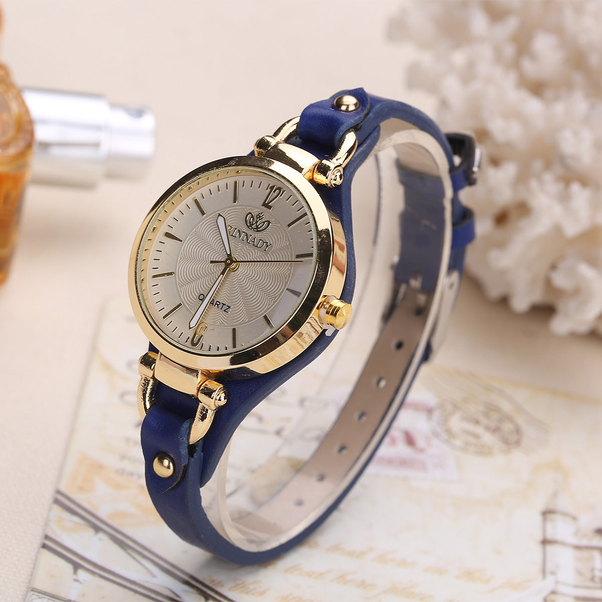 Quartz watch with thin leather strap, solid color,