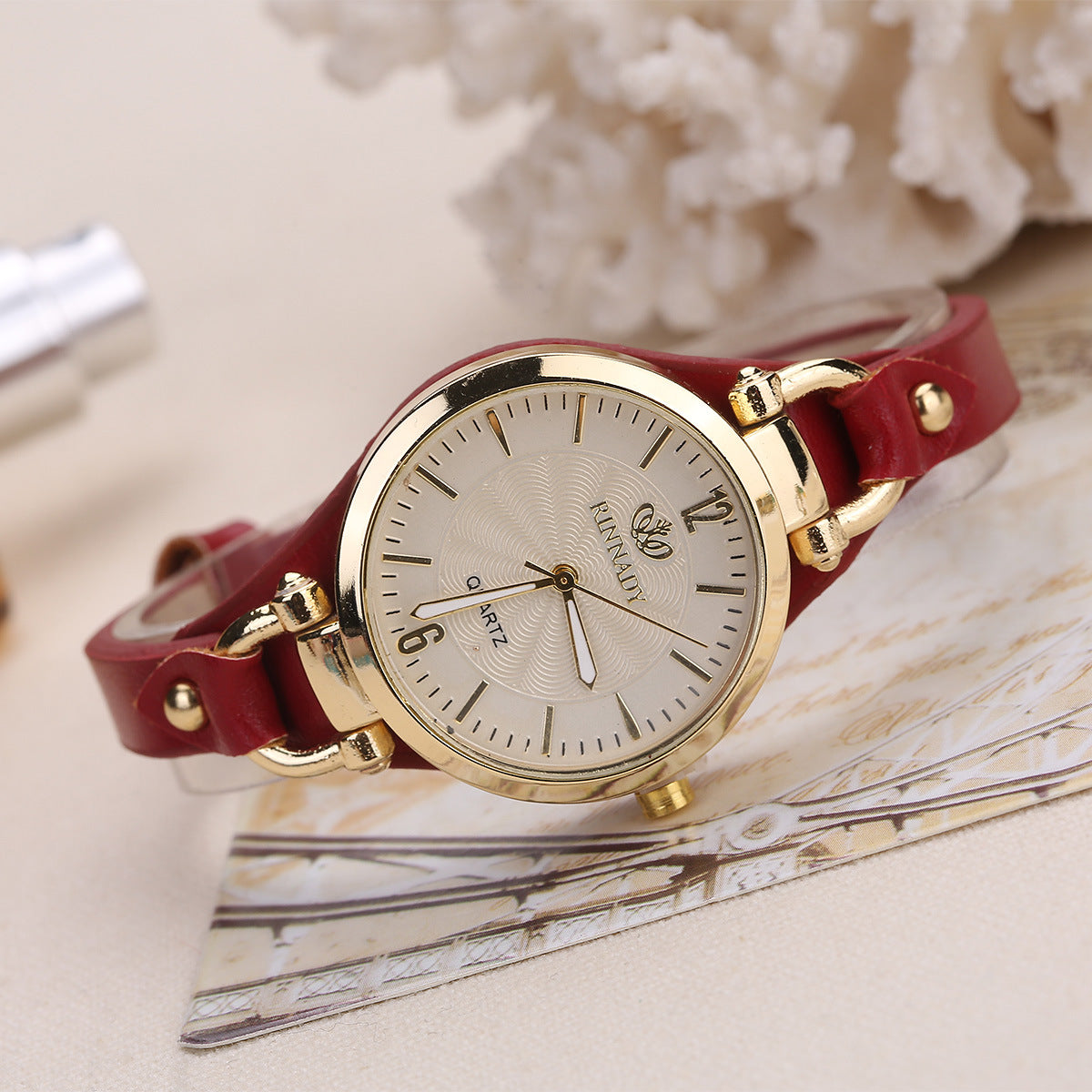 Quartz watch with thin leather strap, solid color,