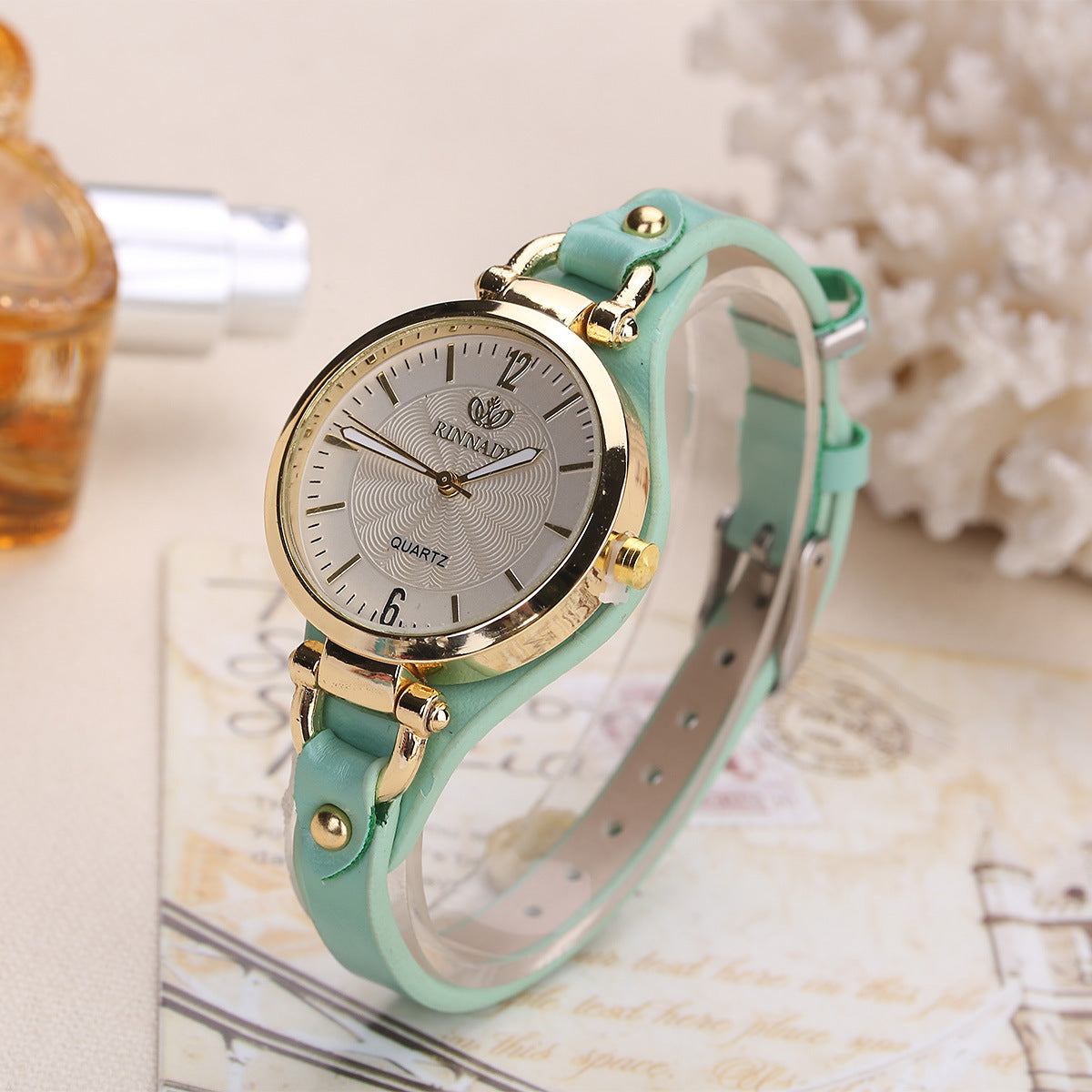 Quartz watch with thin leather strap, solid color,