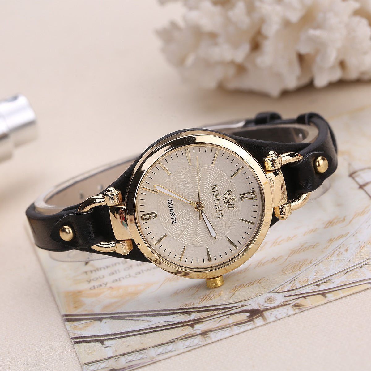 Quartz watch with thin leather strap, solid color,