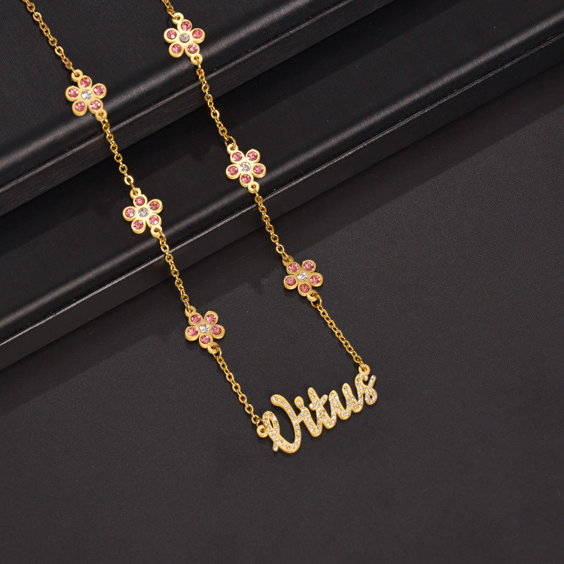 Personalized necklace with diamond-encrusted flower